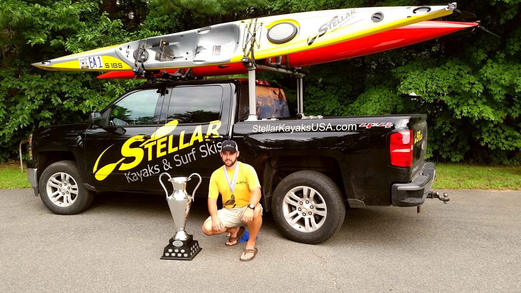 Man with Stellar Kayaks on truck